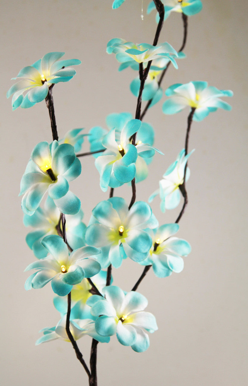 A 50cm tall LED Blue Frangipani Tree Branch Fairy Light with 20 flowers, showcasing a vibrant blue color, perfect for indoor and outdoor decoration.